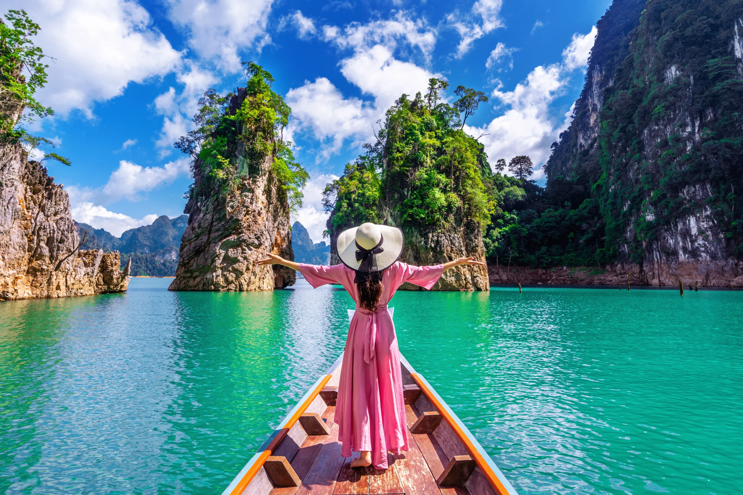 beautiful-girl-standing-boat-looking-mountains-ratchaprapha-dam-khao-sok-national-park-surat-thani-p